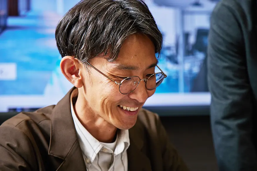 笑顔のプランナー社員